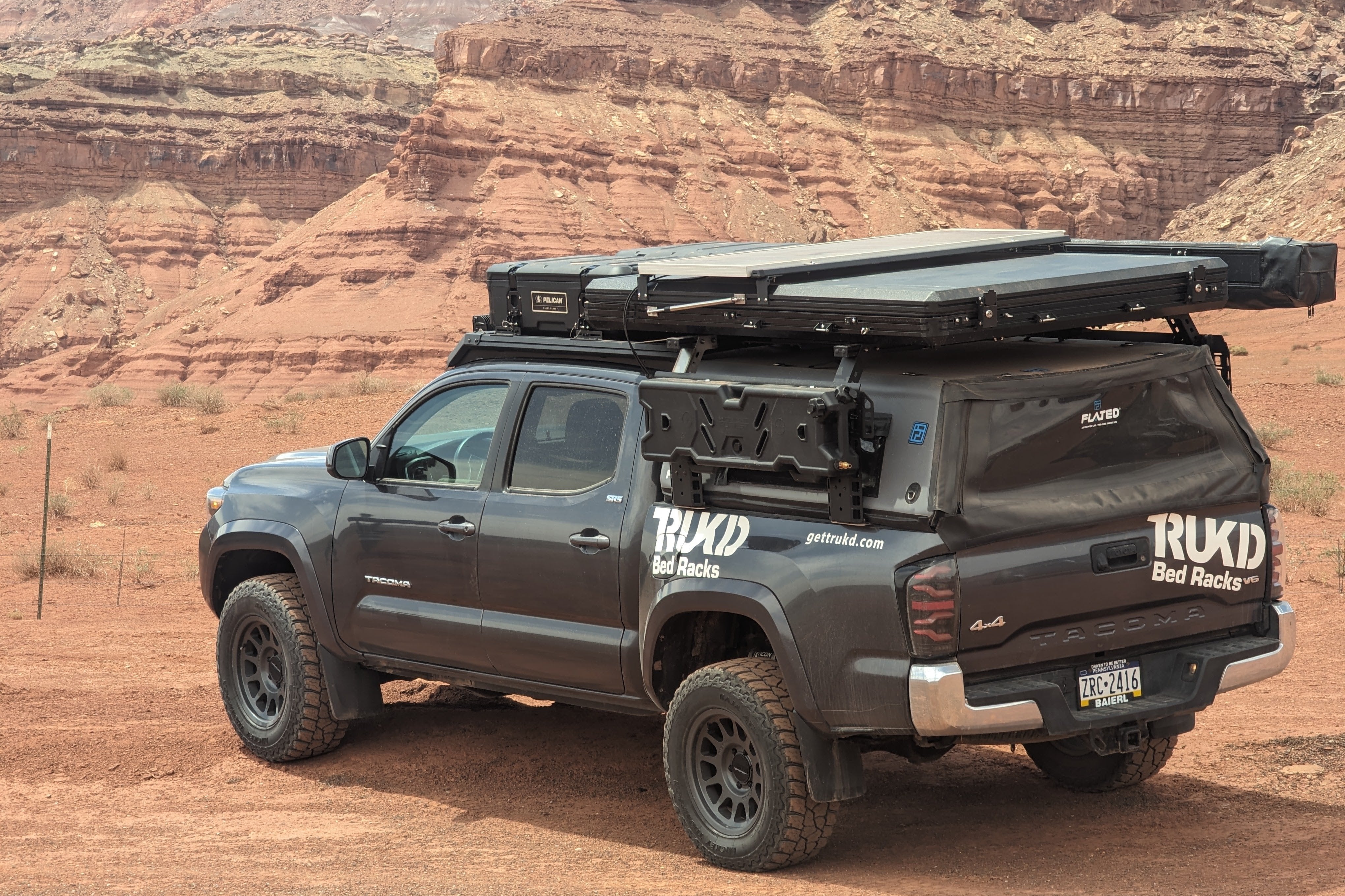 Manufacturer photo of a TRUKD bed-rack installation on a Tacoma.
